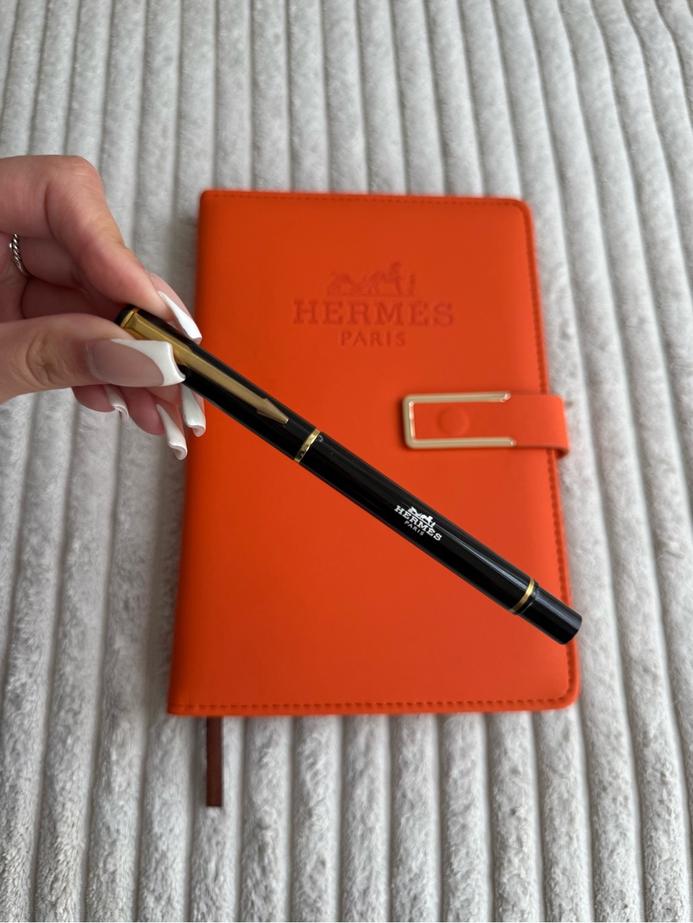 Hermes Orange Leather Planner with Black & Gold Pen